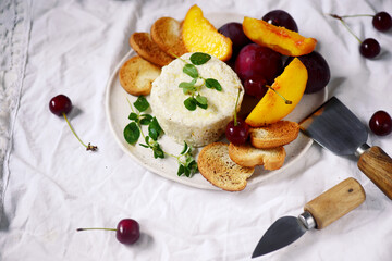Farmer camembert cheese on the cutting board. selective focus