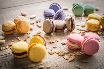 macarons set on wooden background. composite