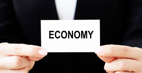 The inscription on the business card, which we'll have in front of us, is ECONOMY.