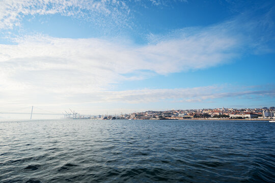 Tagus river in Lisbon. View on Bridge and city shore.