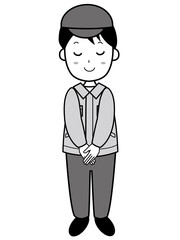 おじぎをする作業服姿の若い男性