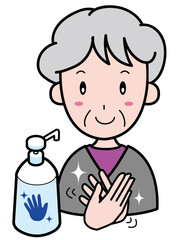 手をアルコール消毒するおばあさん（上半身）