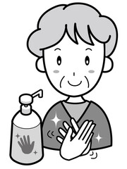 手をアルコール消毒するおばあさん（上半身）