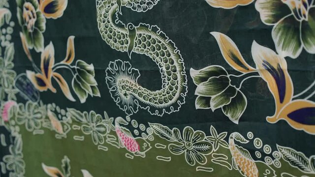 Batik fabric drying on ropes in the garden at Java Indonesia