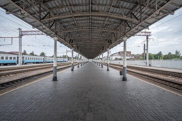 Empty railway platform in the style of the 19th century. Konotop railway station, Ukraine.