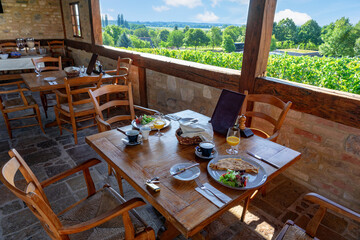 idyllic breakfast table with a nice view in the nature