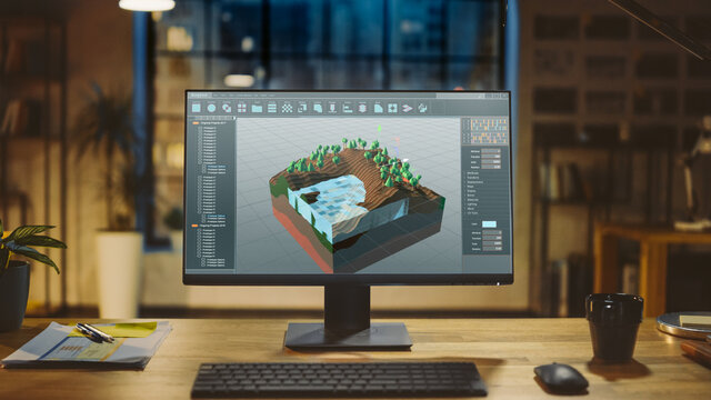 Shot of a Desktop Computer with 3D Video Game Level Development Software in the Modern Office. Stylish Creative Studio Office.