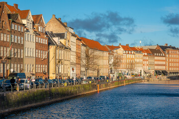 Fototapeta na wymiar Nyhavn is a 17th-century waterfront, canal and entertainment district in Copenhagen, Denmark