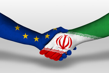 Handshake between iran and european union flags painted on hands, illustration with clipping path.