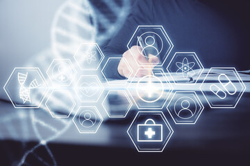 Man's hands working with notes background. Genetic engineering and gene manipulation concept.