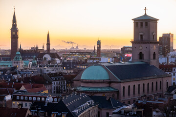 Copenhagen skyline in evening light. Copenhagen old town and copper spiel