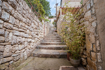 Fototapeta na wymiar Brick stairs in old town Hvar.