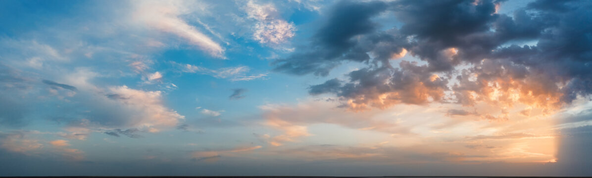 Panorama, cloudy sky at sunset. Pink clouds. © maykal