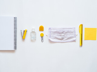 Top view of stationery supplies during covid. Back to school concept during coronavirus