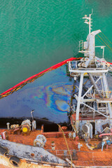 Tanker after the accident, overturned in the water.