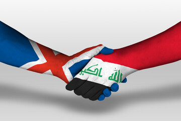 Handshake between iraq and iceland flags painted on hands, illustration with clipping path.