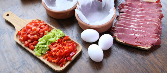 tomato eggs dried meat bacon preparation for cooking