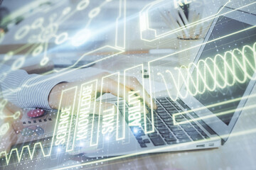 Science hologram with man working on computer on background. Concept of study. Double exposure.