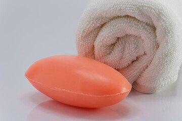 A bar of soap and a clean white towel