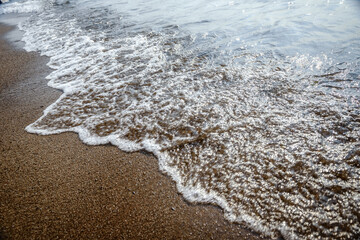 The bubble wave on the sand.