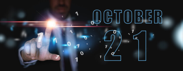 october 21st. Day 20 of month, announcement of date of business meeting or event. businessman holds the name of the month and day on his hand. autumn month, day of the year concept