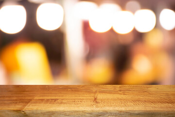 Product display on brown wooden table Bokeh background from the bulb shop