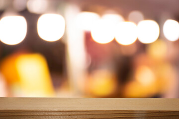 Product display on brown wooden table Bokeh background from the bulb shop