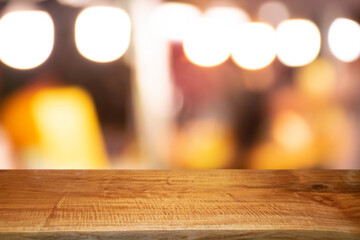 Product display on brown wooden table Bokeh background from the bulb shop