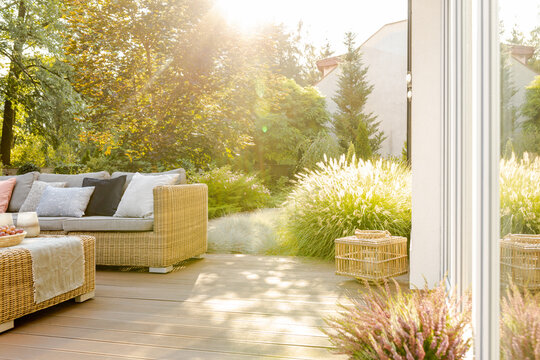 Beautiful Summer Day In Elegant Home Garden With Trendy Furniture