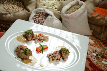 traditional turkish ottoman food in front of legume family sacks