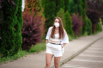 European woman is going to work. She wears N95 mask. It prevents PM2.5 dust and smog.