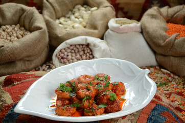 traditional turkish ottoman food in front of legume family sacks