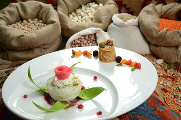 turkish traditional dessert in front of legume family sacks