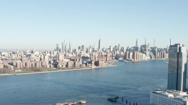 NYC Skyline with Empire State Building From Brooklyn side with fancy Condos in foreground neutral CC