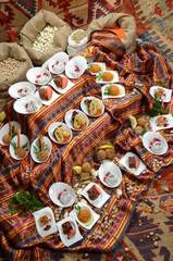 traditional turkish ottoman food in front of legume family sacks