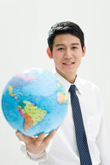 business man holding globe