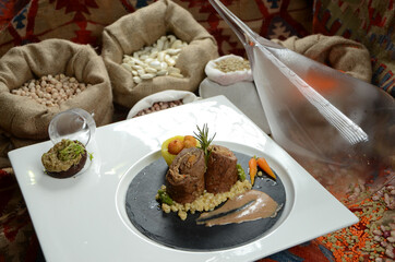 traditional turkish ottoman food in front of legume family sacks