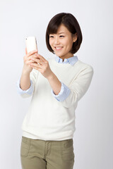young woman holding a mobile phone