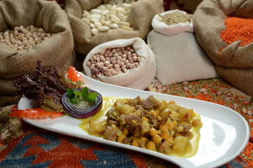 traditional turkish ottoman food in front of legume family sacks