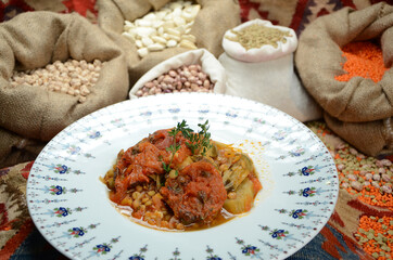 traditional turkish ottoman food in front of legume family sacks