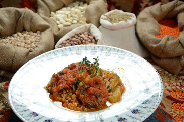traditional turkish ottoman food in front of legume family sacks