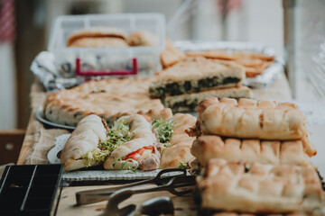 Full table of home made fresh richly filled pastry from local manufacturer during the farmers markets in Czech republic