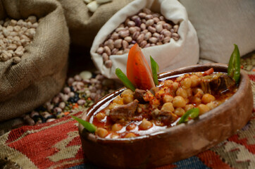 traditional turkish ottoman food in front of legume family sacks