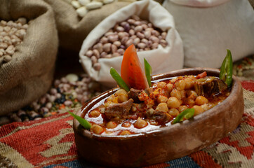 traditional turkish ottoman food in front of legume family sacks