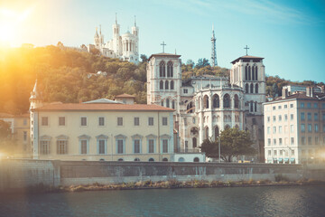 View from Saone river of Fourviere hill with Cathedral and Notre-Dame de Fourviere Basilica, Lyon,...
