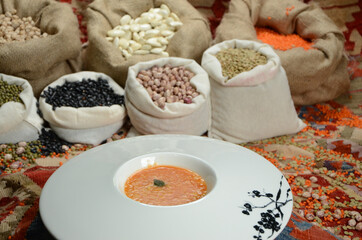 traditional turkish cuisine soup in front of legume family sacks