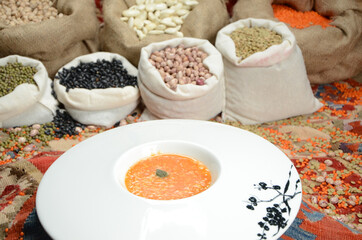 traditional turkish cuisine soup in front of legume family sacks