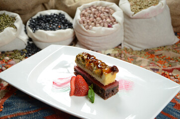 traditional dessert in front of legume family sacks