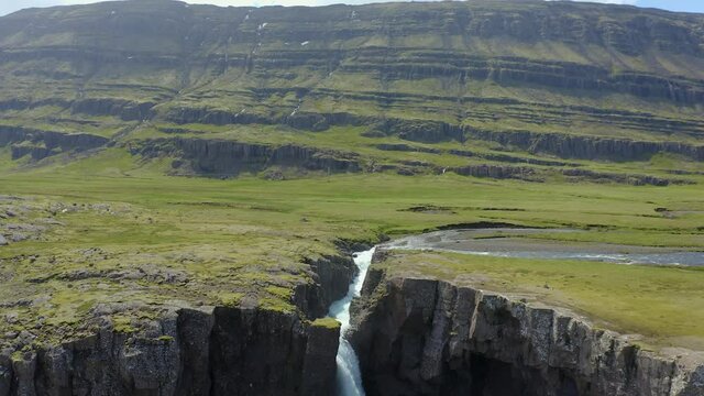Flying above the Folaldafoss waterfall in east Iceland