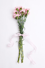 carnation tied with ribbon